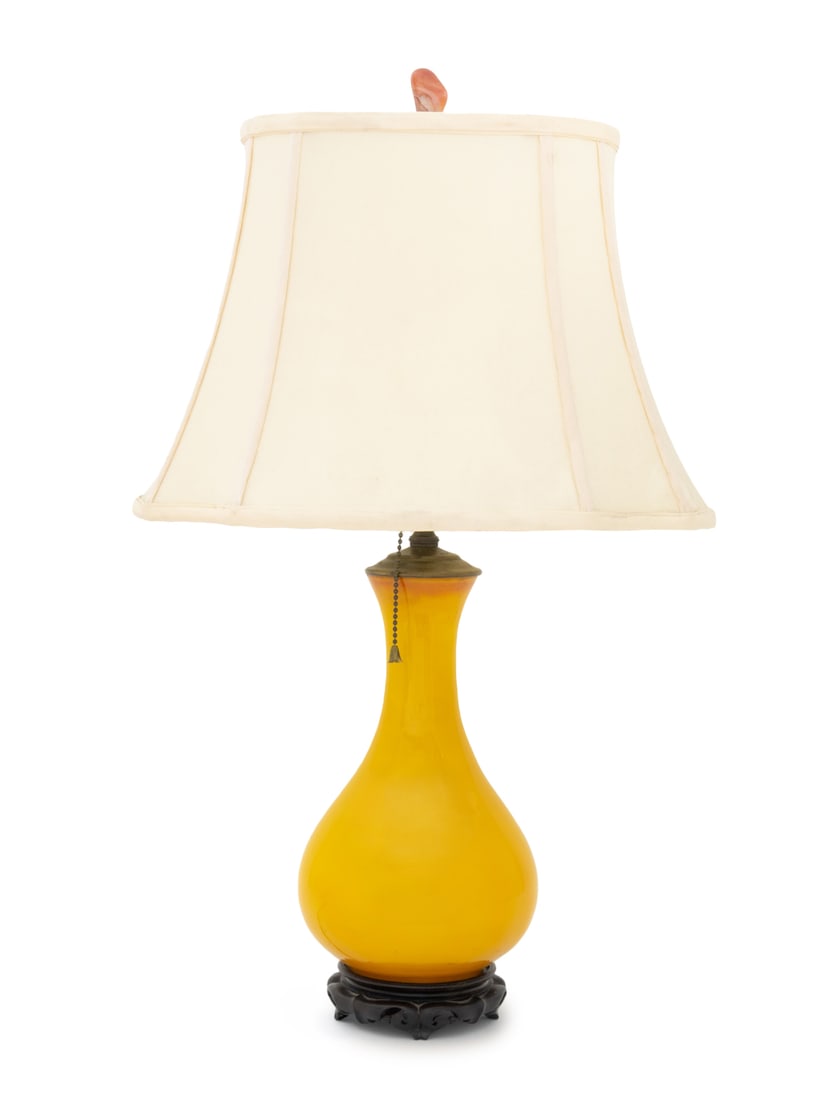 Chinese Yuhuchunping Vase Mounted as a Lamp: Chinese Yellow Glazed Porcelain Yuhuchunping Vase Mounted as a Table Lamp, the vessel mounted on a pierced carved wood base and surmounted by a carnelian banded agate finial, with cream silk shade. Ov