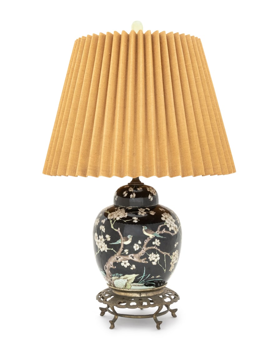 Chinese Famille Noire Ginger Jar as Lamp: Chinese Famille Noire Ginger Jar Mounted as Lamp, with hand-painted bird and branch motif on pierced silvered metal base. Overall: 24.25" H x 14" Diameter. Provenance: From an East 74th Street Estate.