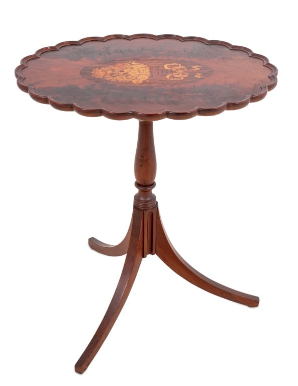 George III Style Mahogany & Marquetry Tripod Table: George III Style Flame Mahogany, Rosewood, and Marquetry Tripod Table, 20th century, the hinged scalloped top above a tapering column on three splayed legs. 28" H x 24" W x 18" D. Keywords: British Fu