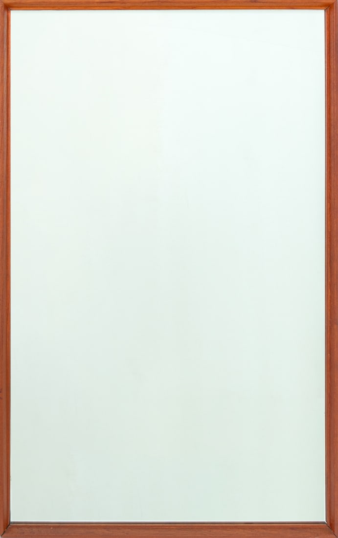 Mid-Century Modern Walnut Mirror: Mid-Century Modern Walnut Rectangular Mirror. Mirror plate: 49 H x 30" W; frame: 51.25" H x 32.25" W x 2" D. Provenance: From a Long Island, New York Estate. Keywords: Looking glass, Vanity, Wall mirr