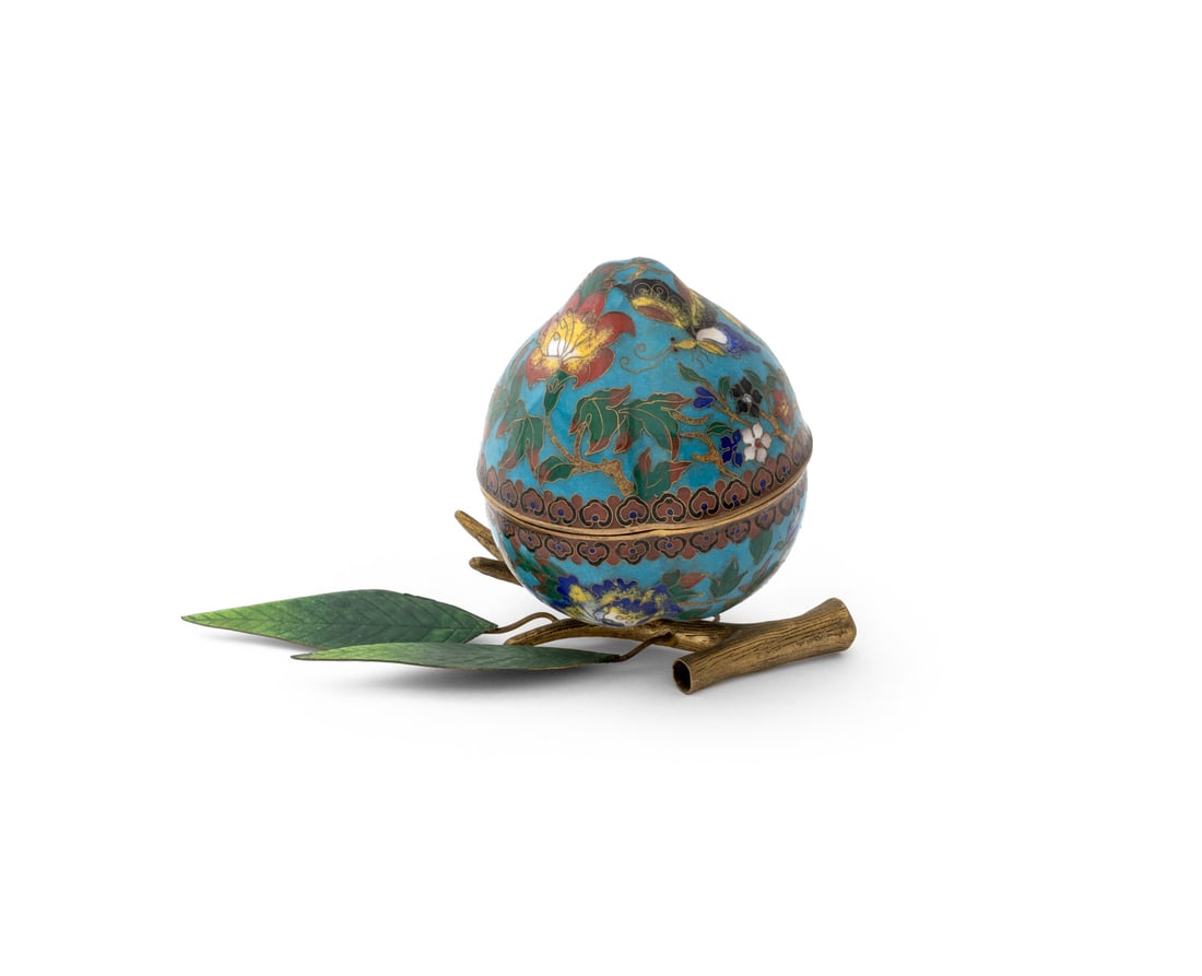Chinese Cloisonne Peach Form Box: Chinese Cloisonne Enamel Peach Form Box, upon a gilt metal branch form with green enameled leaves. 5.25" H x 8.25" W x 5.5" D. Provenance: From an East 74th Street Estate. Keywords: Asian Art, China,