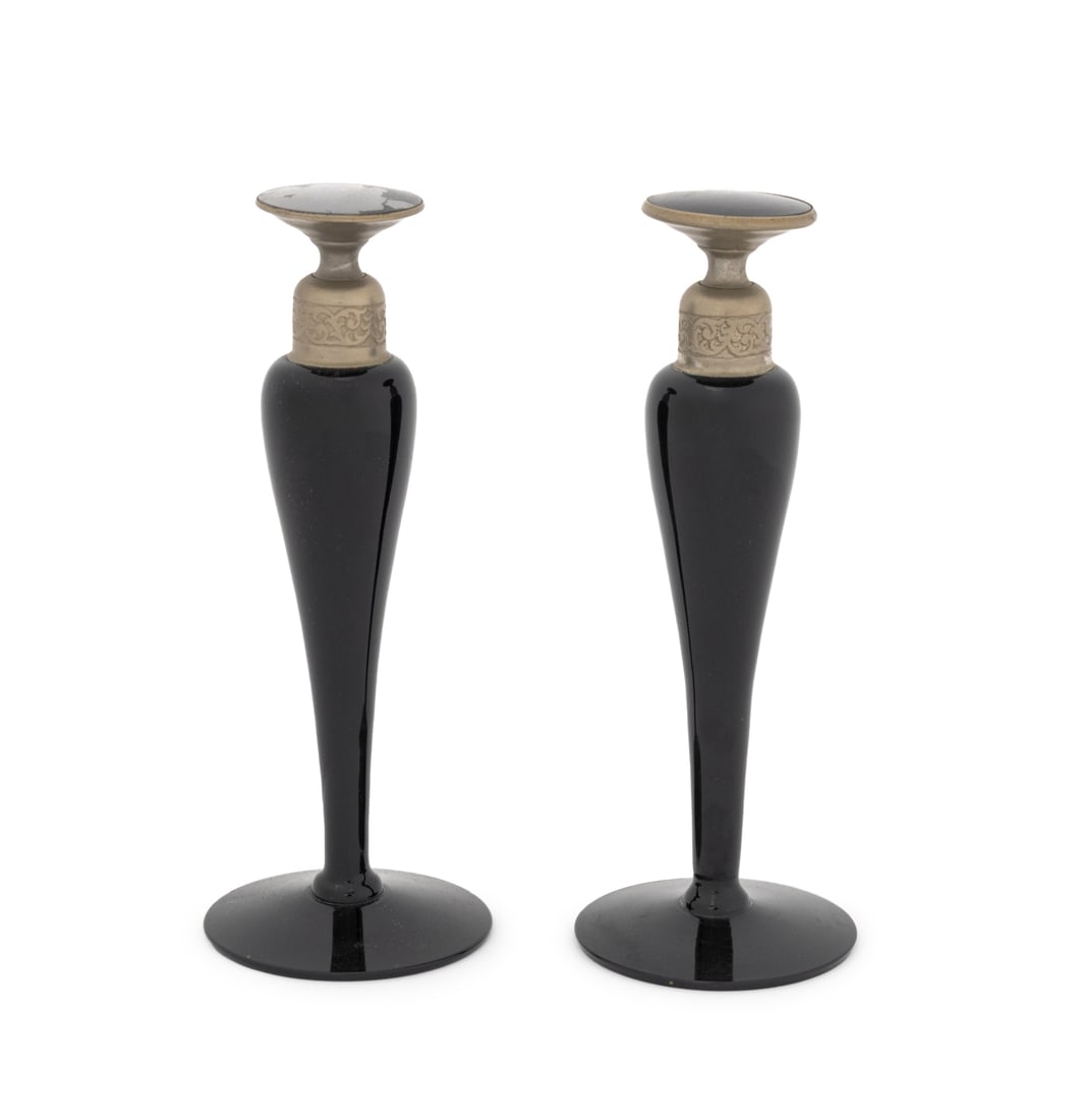 De Vilbiss Art Deco Black Glass Scent Bottles, Pr.: Pair of De Vilbiss Art Deco Black Glass Scent Bottles, second quarter 20th century, each with pewter and glass stopper and marked to underside. 6" H x 2.25" Diameter. Provenance: From an East 74th Str
