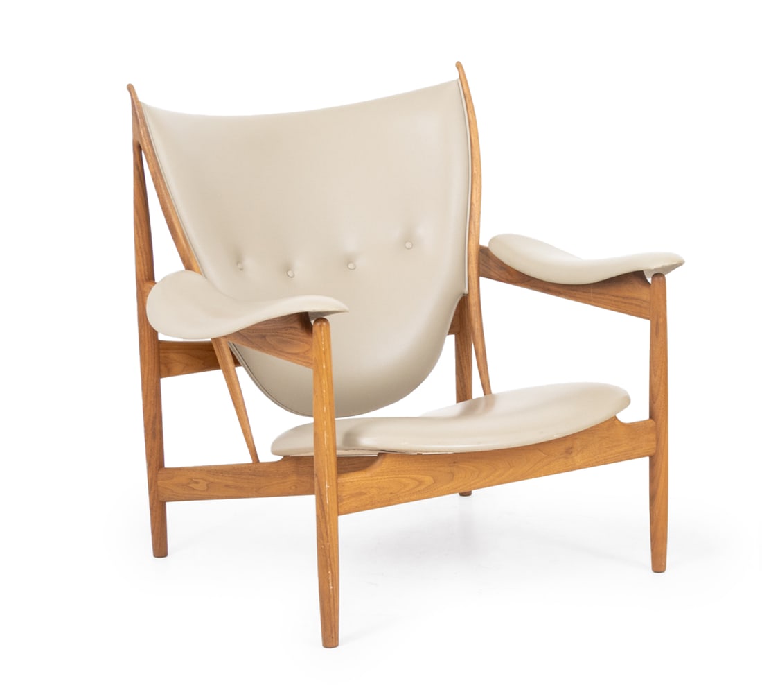 Finn Juhl "Chieftain" Lounge Chair: Finn Juhl (Danish, 1912-1989)"Chieftain" Lounge Chair, walnut frame and tan leather upholstery, with "One Collection / Finn Juhl / House of Finn Juhl" label and stamped "Finn Juhl" to underside.