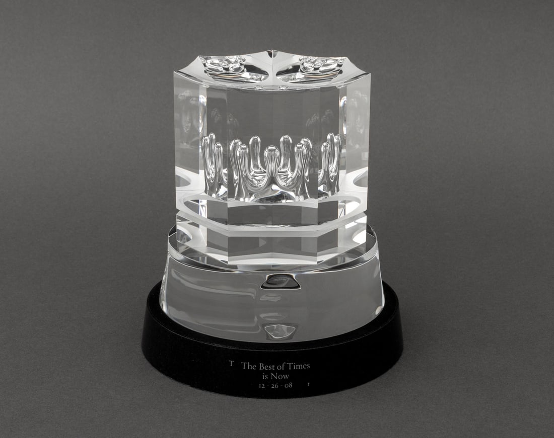 Steuben Glass Crown Sculpture, 2008: Steuben Glass Crown Sculpture, 2008, custom design and production by Steuben Design Team, marked "Steuben" to underside, together with circular black granite plinth inscribed "The Best of Times / is