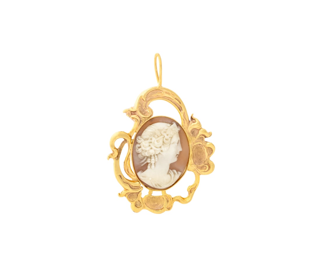 14K Yellow Gold Cameo Pendant: 14K Yellow Gold Cameo Pendant, featuring one bezel set carved cameo framed in 14K yellow gold, worn with necklace through fixed bail. Gold tested. Measuring approx. 3 1/4" x 2 1/4", 23.3 dwt.