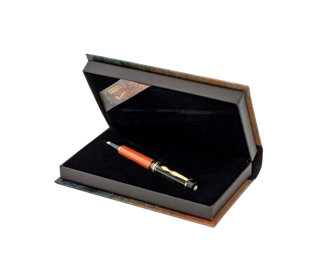 Montblanc Ernest Hemingway Ballpoint Pen, 1992: Montblanc Ernest Hemingway Ballpoint Pen, 1992, from Writer's Edition series, with orange and black resin case and gold-plated accents and clip, no. 4565, marked "Meisterstruck / Montblanc", with orig