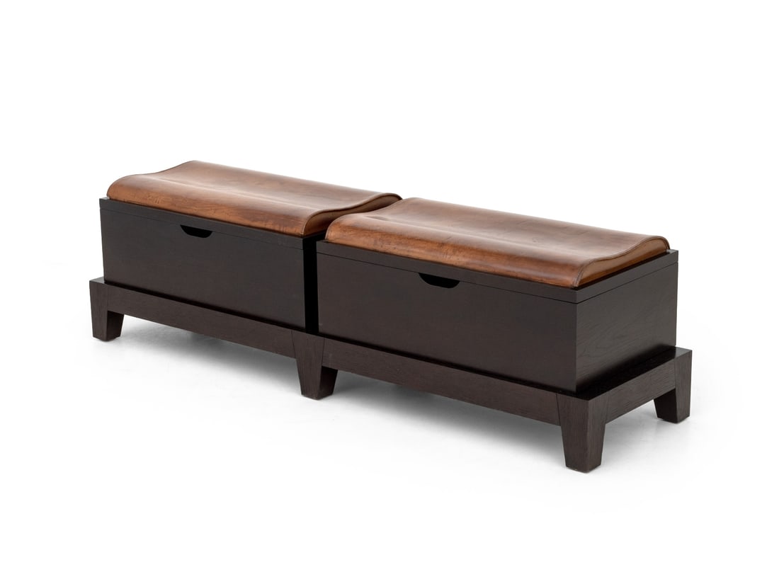 Promemoria Leather and Oak Veneer Storage Bench: Promemoria Leather and Oak Veneer Storage Bench, with two leather seats atop storage bins mounted on rectangular base, marked "Promemoria" to the interior lids. 19.25" H x 68.5" W x 18.75" D.