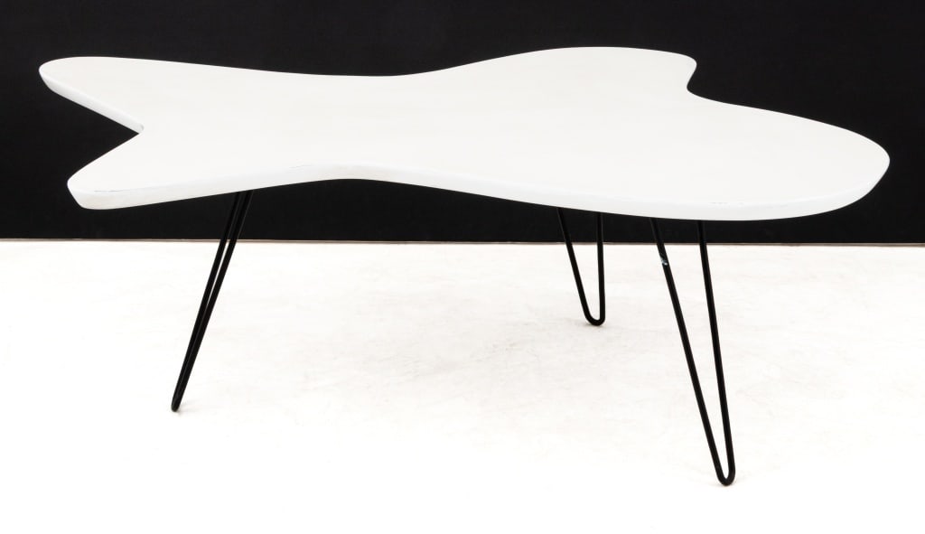 Jens Risom Modernica "Amoeba" Style Coffee Table: Jens Risom Modernica "Amoeba" Style Coffee Table, white laminate table top above patinated steel tripod base. 17.25" H x 48" W x 31" D. Provenance: From a SoHo Collection. Keywords: Vintage