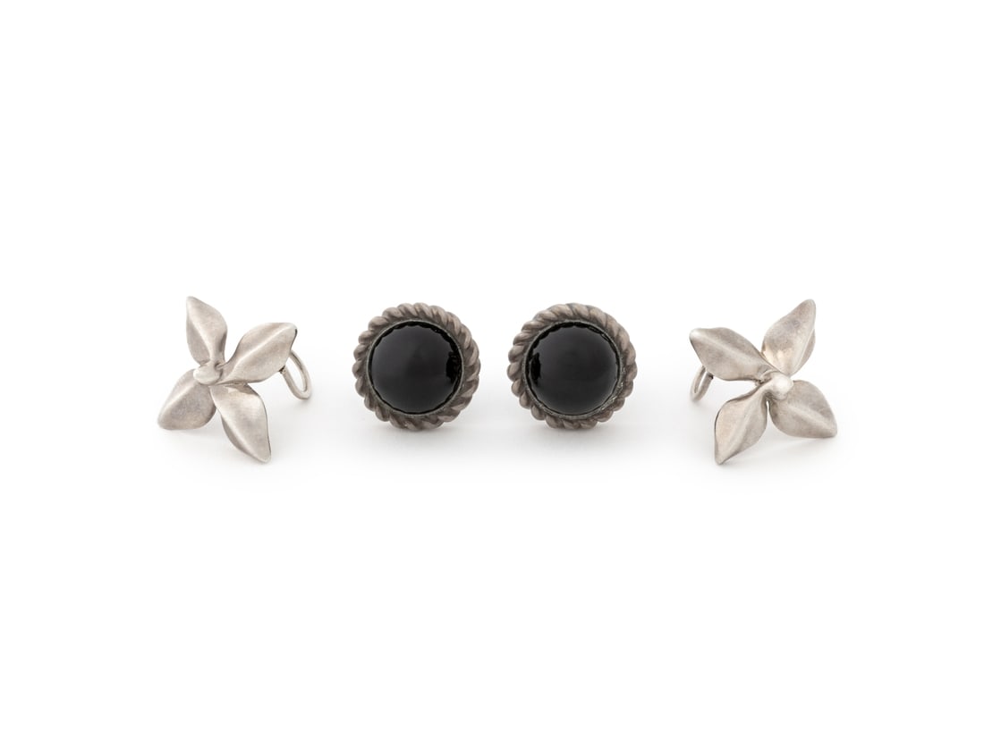Tiffany and Co. Sterling Silver Earrings, 2 Pairs: Two Pairs of Tiffany and Company Sterling Silver Earrings, comprising: flower form with clip-on posts, marked "Tiffany & Co. / 925" and circular black cabochons with rope twist border, marked "925 / T