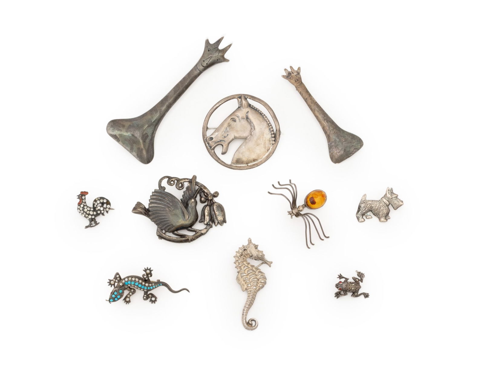 Vintage Animal Form Sterling Silver Brooches, 10: Group of Ten Vintage Animal Form Sterling Silver Brooches, comprising: two stylized giraffe forms, one marked "925", a silver and amber spider form pin, a faux pearl mounted lizard form, a French past