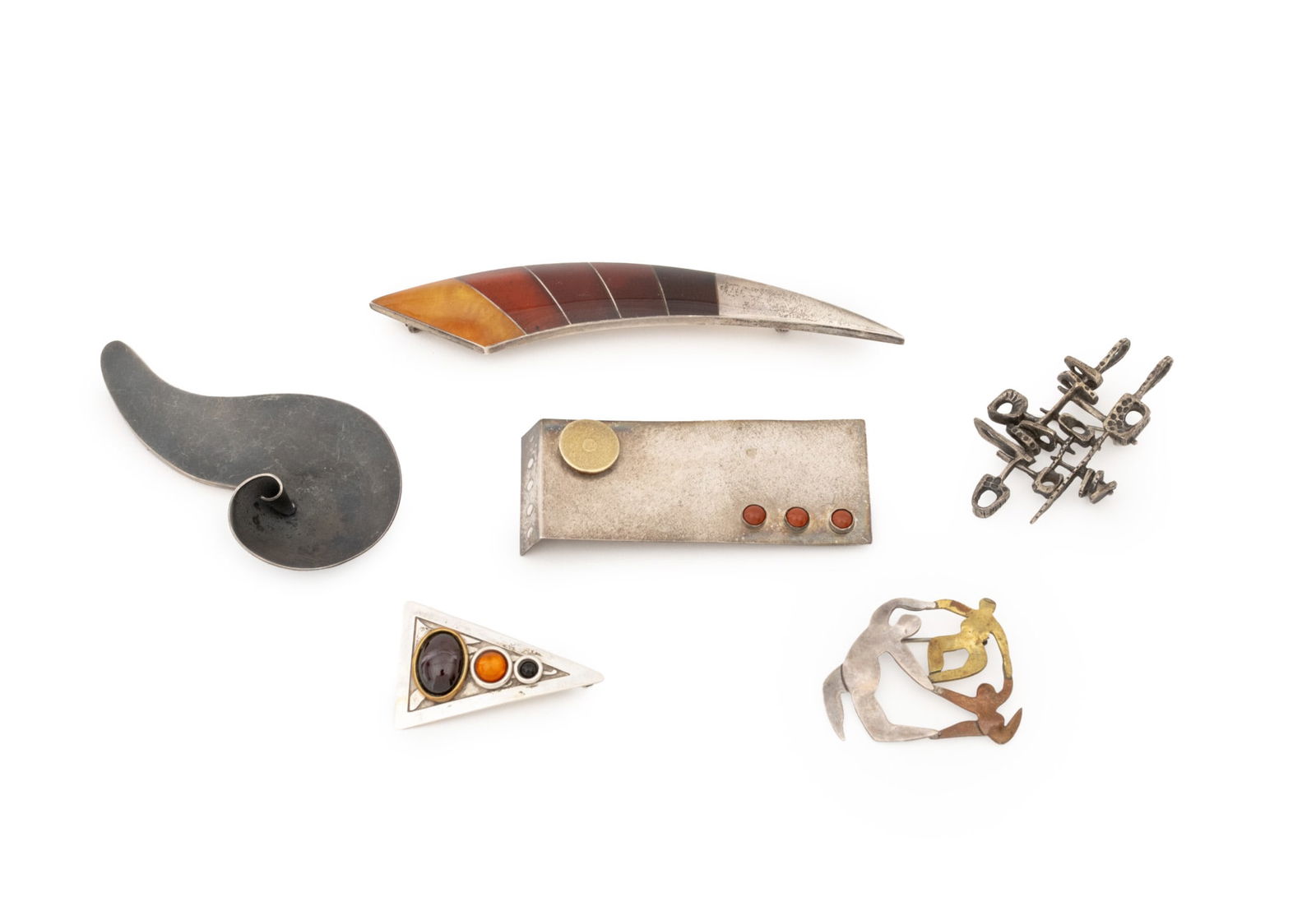 Modernist Silver Brooches, 6: Group of Six Modernist Silver Brooches, comprising: an antiqued sterling silver swirl form marked "925" with stylized omega form maker's mark, a three graces motif mixed metal form marked "Far Fetched