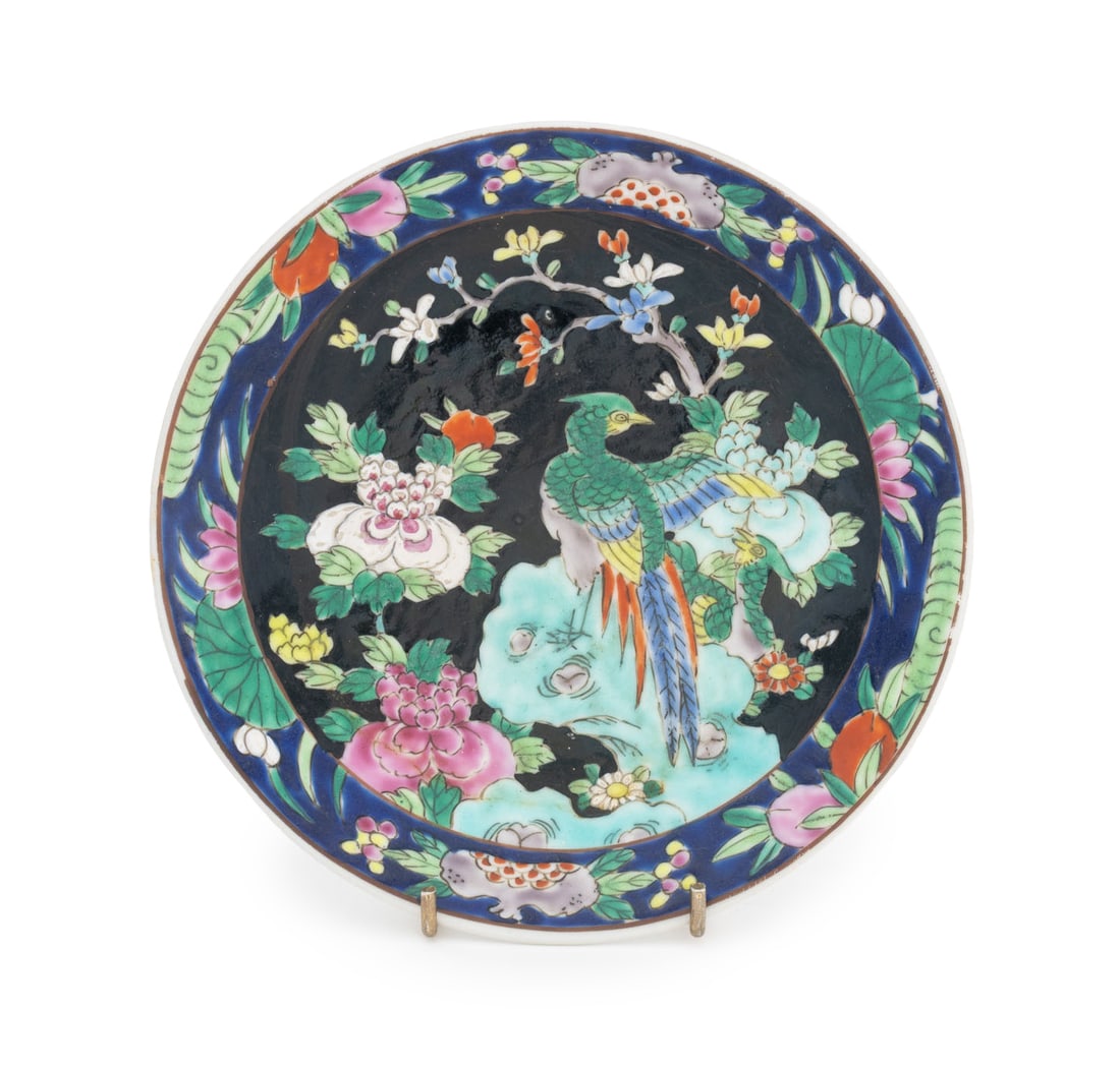 Chinese Phoenix Motif Famille Noir Porcelain Plate: Chinese Phoenix Motif Famille Noir Porcelain Plate, hand-enameled with a bird amongst flowering branches, copper red mark to underside. 7.25" Diameter x 1" H. Provenance: From a Connecticut Estate. Ke
