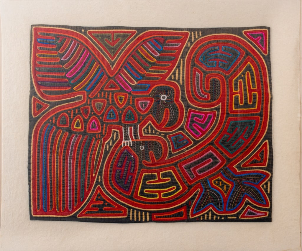 Panamanian Kuna Mola Textile: Panamanian Kuna Mola Textile, depicting two parrots, clear acrylic frame. Image: 15.25" H x 19" W; frame: 20.25" H x 24.25" W. Provenance: From a New York City Collection. Keywords: Panamanian,