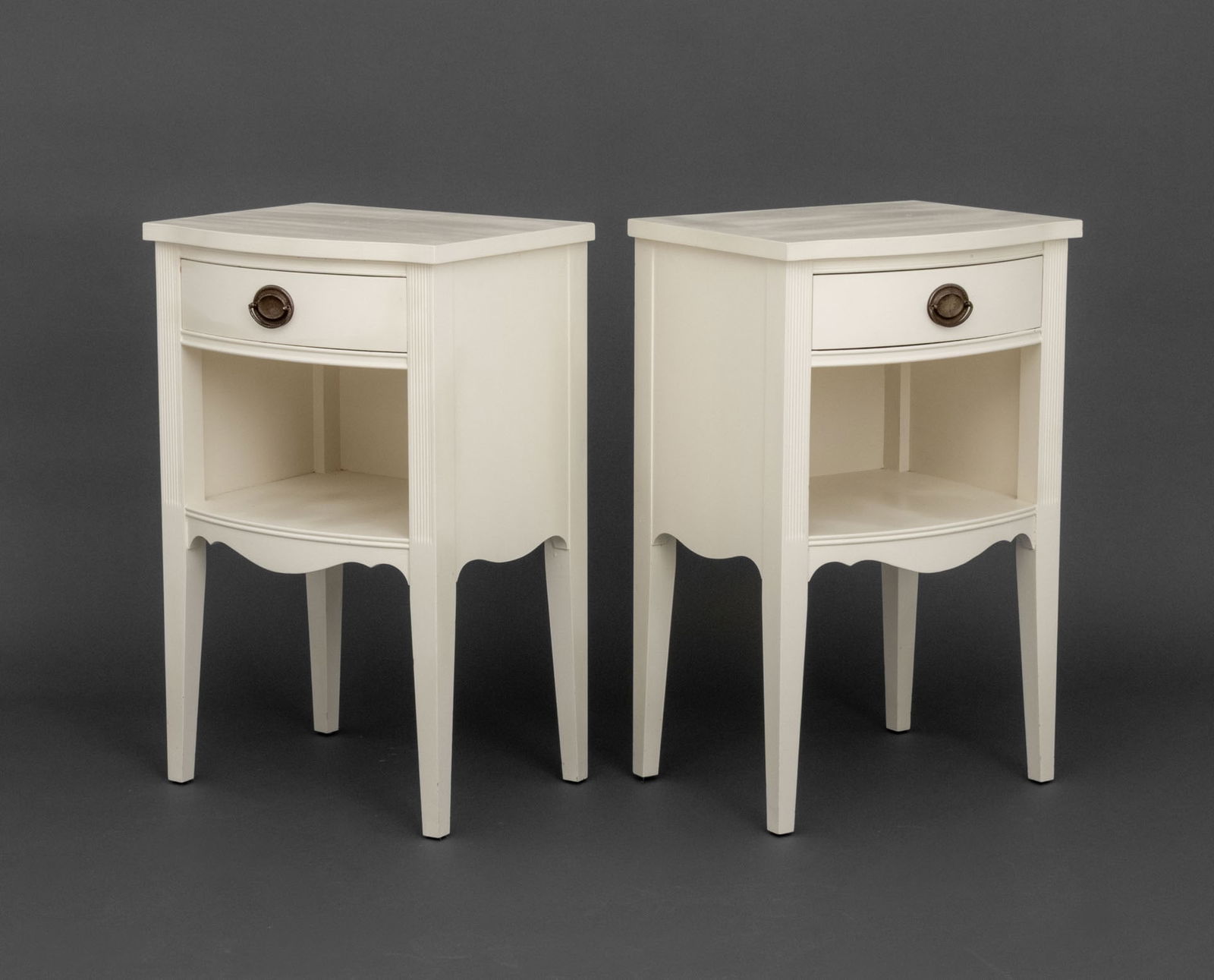 White Fine Furniture Painted Nightstands, Pair: Pair of White Fine Furniture Painted Nightstands, each with single drawer above open shelf, marked "White Fine Furniture" to drawer. 28.25" H x 18" W x 14" D. Provenance: From a Connecticut Estate. Ke