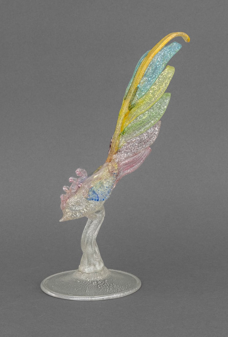 Murano Art Glass Pheasant Sculpture: Murano Art Glass Pheasant Sculpture, with silver leaf flecks and multicolored feathers on circular base. 10.5" H x 4.25" W x 7.75" D. Provenance: From a Connecticut Estate. Keywords: Statue, Figurine,
