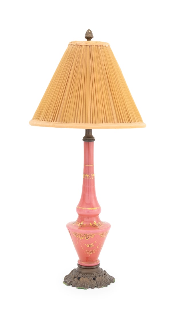 Bohemian Pink Glass Vase Mounted as Lamp: Bohemian Pink Glass Vase Mounted as Lamp, with gilt and painted floral motif mounted on grapevine bronzed metal base. Overall: 17" H x 7.75" Diameter. Keywords: Lighting, Glassware, Studio glass,