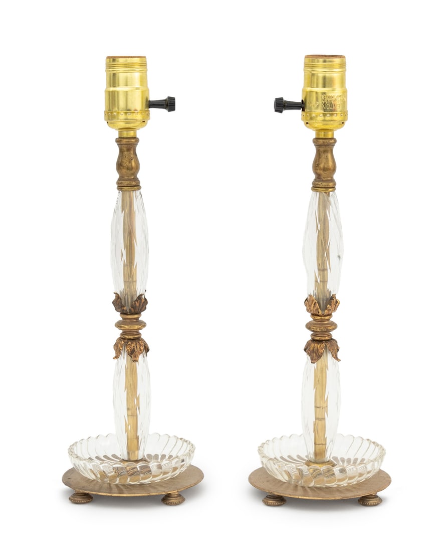 Art Deco Style Brass and Cut Crystal Lamps, Pair: Pair of Art Deco Style Brass and Cut Crystal Lamps. 13.25" H x 4.75" Diameter. Provenance: From a Connecticut Estate. Keywords: Lighting, Table lamps, Accent lamps, Acanthus leaf, Interior design,
