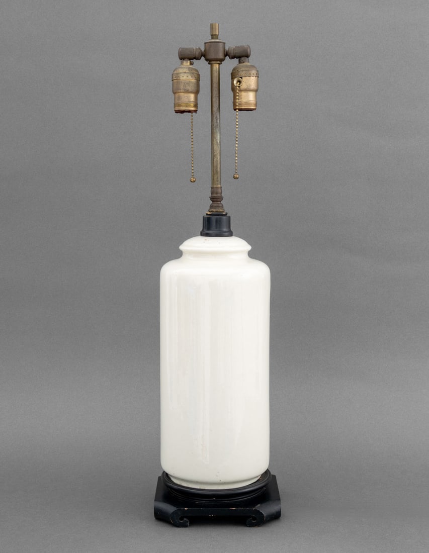 Modern White Glazed Ceramic Jar Mounted as a Lamp: Modern White Glazed Ceramic Jar Mounted as a Table Lamp, on carved Chinese style wood base. 26.5" H x 6.5" W x 6.5" D. Provenance: From a Connecticut Estate. Keywords: Christopher Spitzmiller Style,