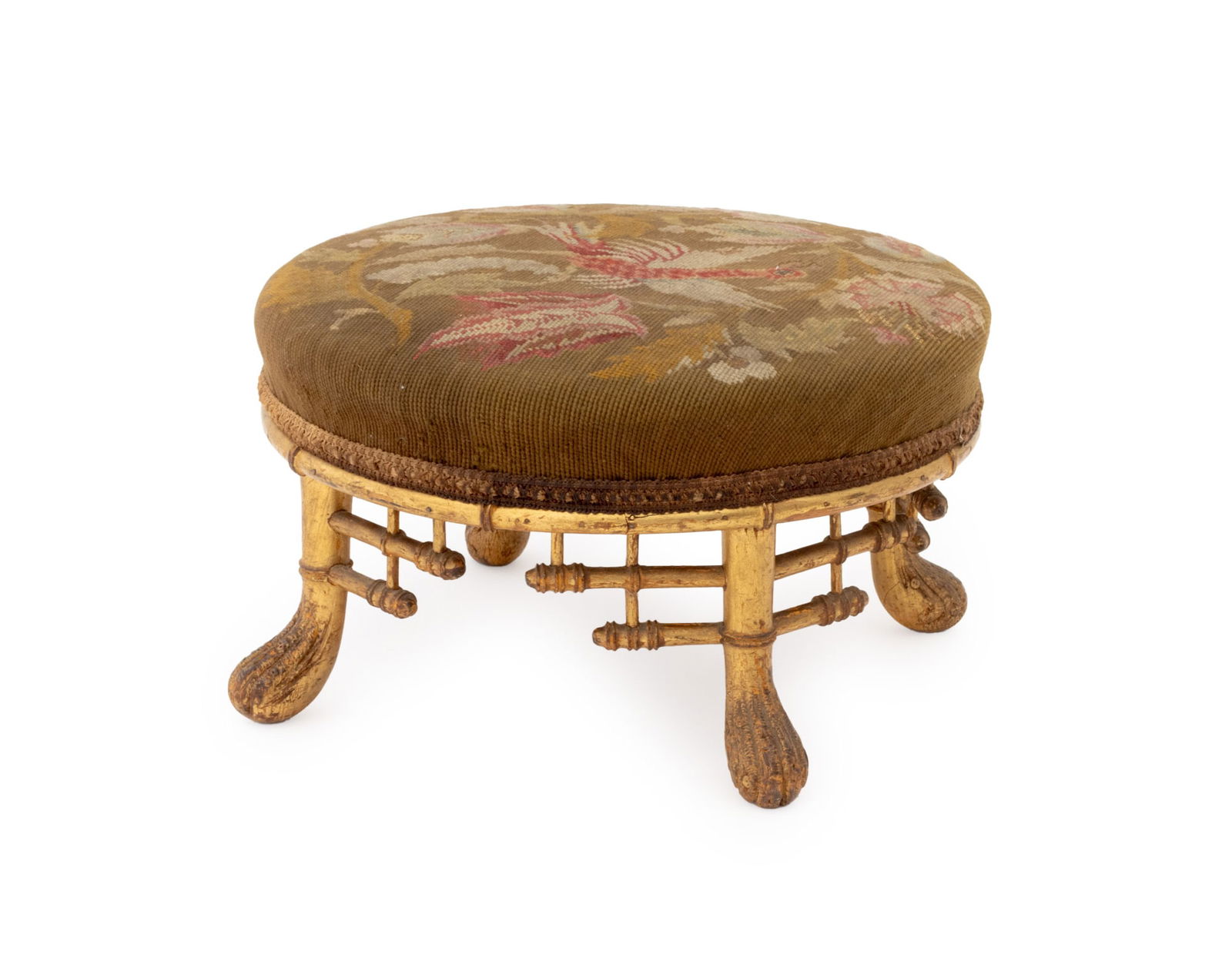 Aesthetic Movement Needlepoint Circular Footstool: Aesthetic Movement Needlepoint Circular Footstool, with floral needlepoint upholstery above giltwood base. 6.75" H x 12.25" Diameter. Provenance: From a Connecticut Estate. Keywords: Antique Furniture