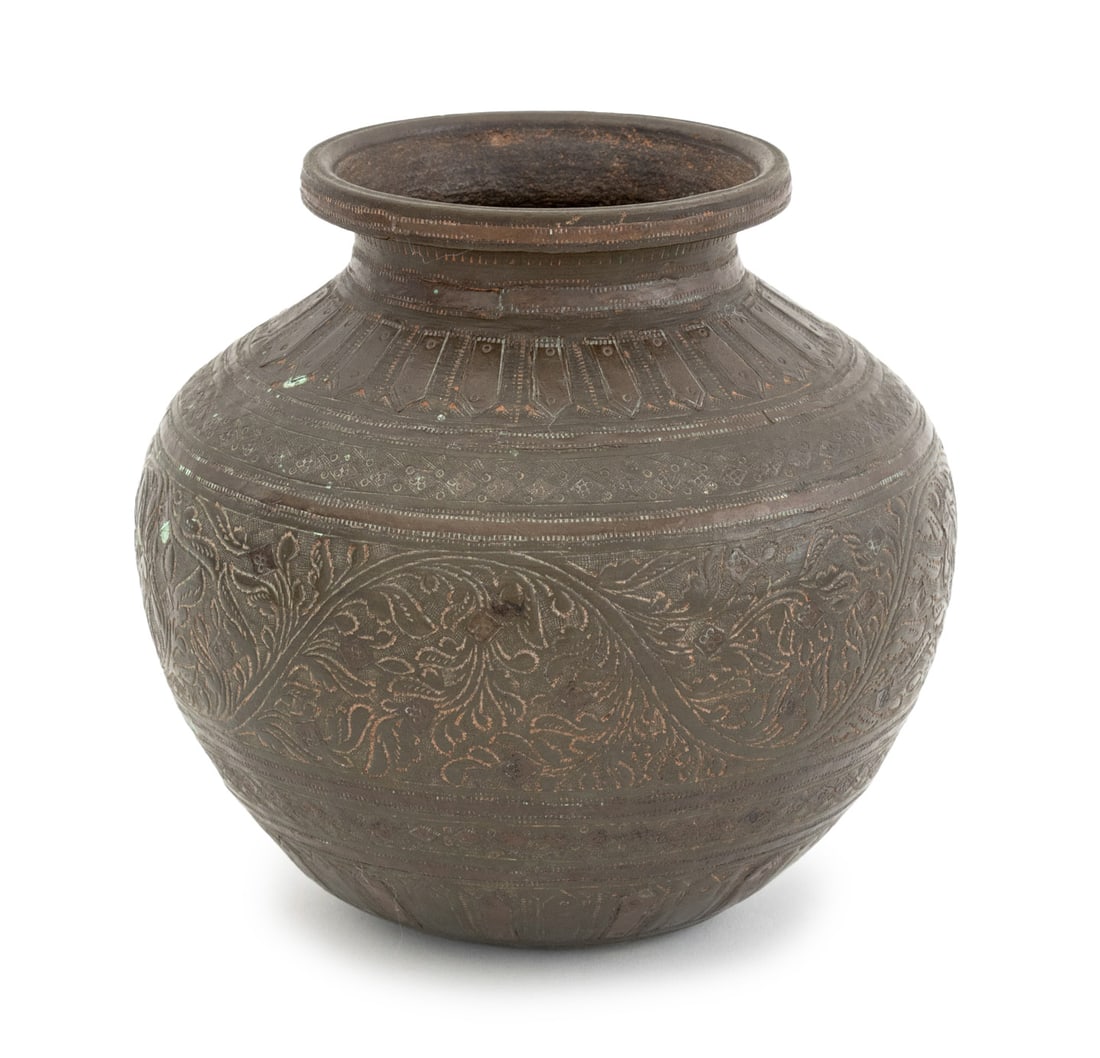 Indian Brass and Copper Lota Water Pot: Indian Brass and Copper Lota Water Pot, with engraved scrolling floral decoration. 6" H x 5.5" Diameter. Provenance: From a New York City Collection. Keywords: Mutka, South Asian Art, Metalwork,