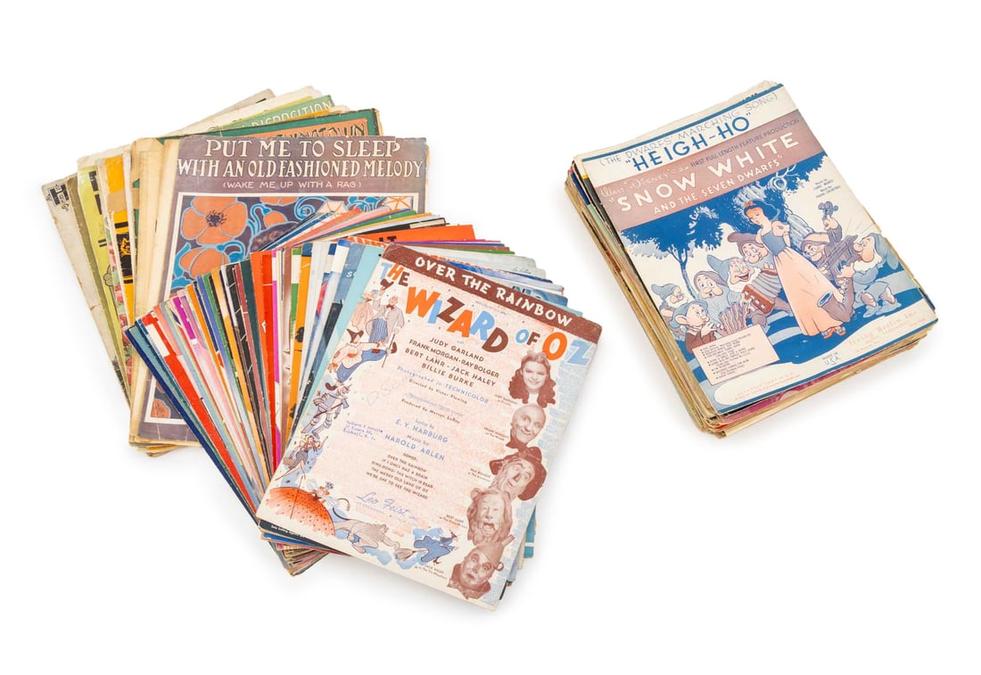 Vintage Golden Age Hollywood Sheet Music, 100+: Collection of Over 100 Vintage Golden Age Hollywood Sheet Music, including: Wizard of Oz, Snow White, Gold Diggers. 14" H x 10.5" W. Provenance: From an Upper East Side, New York City Collection.