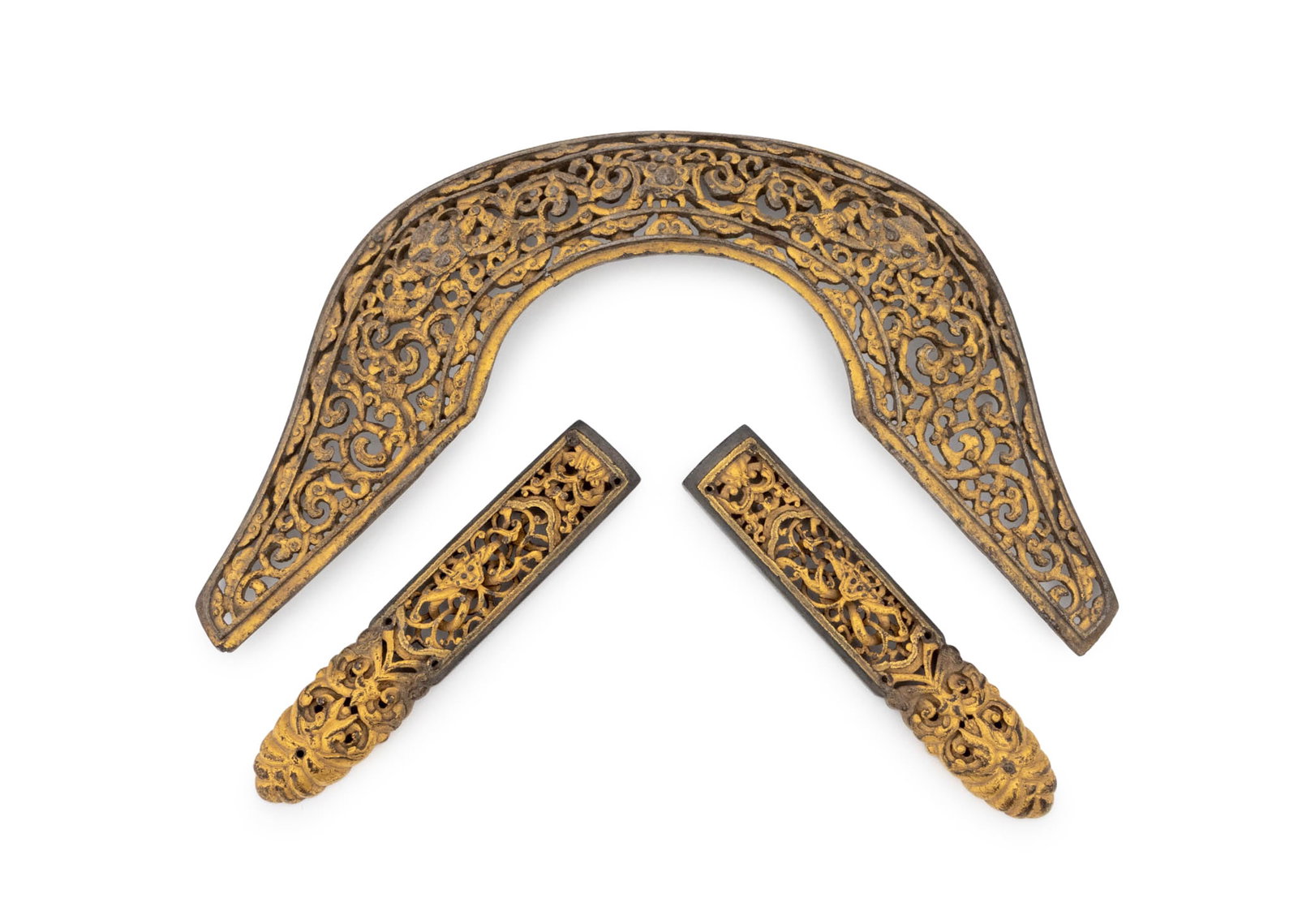 Chinese Tibetan Gilt Iron Saddle Mounts, 3: Set of Three Chinese Tibetan Mythical Beast Motif Gilt Iron Horse Saddle Mounts, 19th century or earlier, with reticulated scrolling floral designs. Largest: 6.75" H x 11.25" W x 1" D. Provenance: Fro