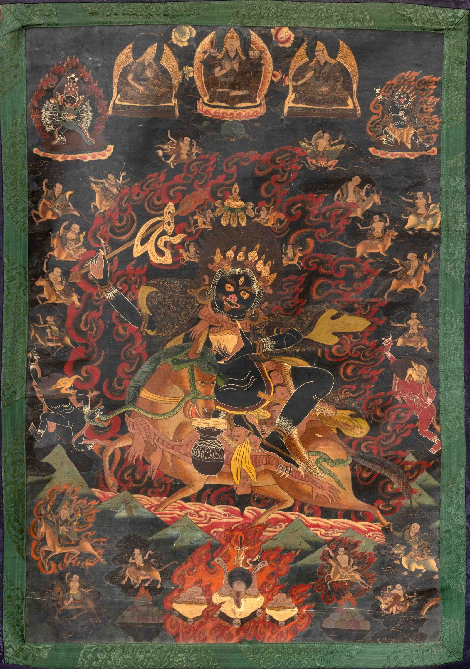 Tibetan Palden Lhamo Thangka Gouache, 18th C.: Tibetan Palden Lhamo Thangka, Gouache on Paper, 18th century, mounted on 19th century silk, depicting the goddess with Tsongkhapa above, surrounded by Bodhisattva and protectors. Image: 30" H x 20.75"