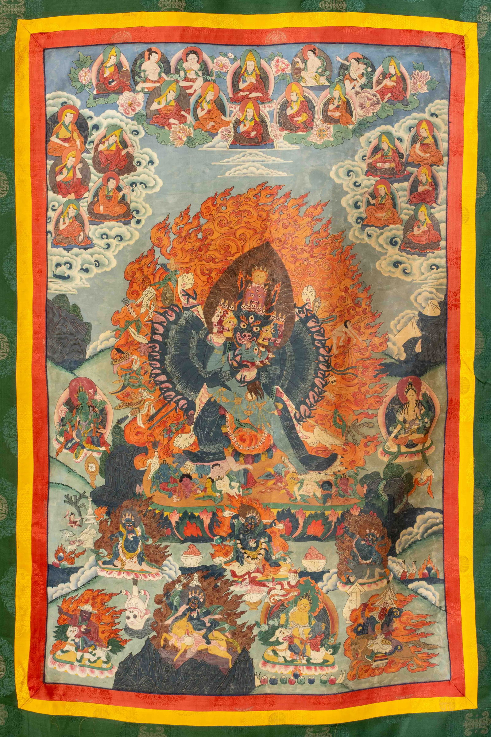 Tibetan Yamantaka Thangka Gouache: Tibetan Yamantaka Thangka, Gouache on Paper, early 20th century, mounted on Nepalese silk, depicting Vajrabhairava. Image: 42.25" H x 27.5; overall: 60" H x 39" W. Provenance: From the Estate of Josep