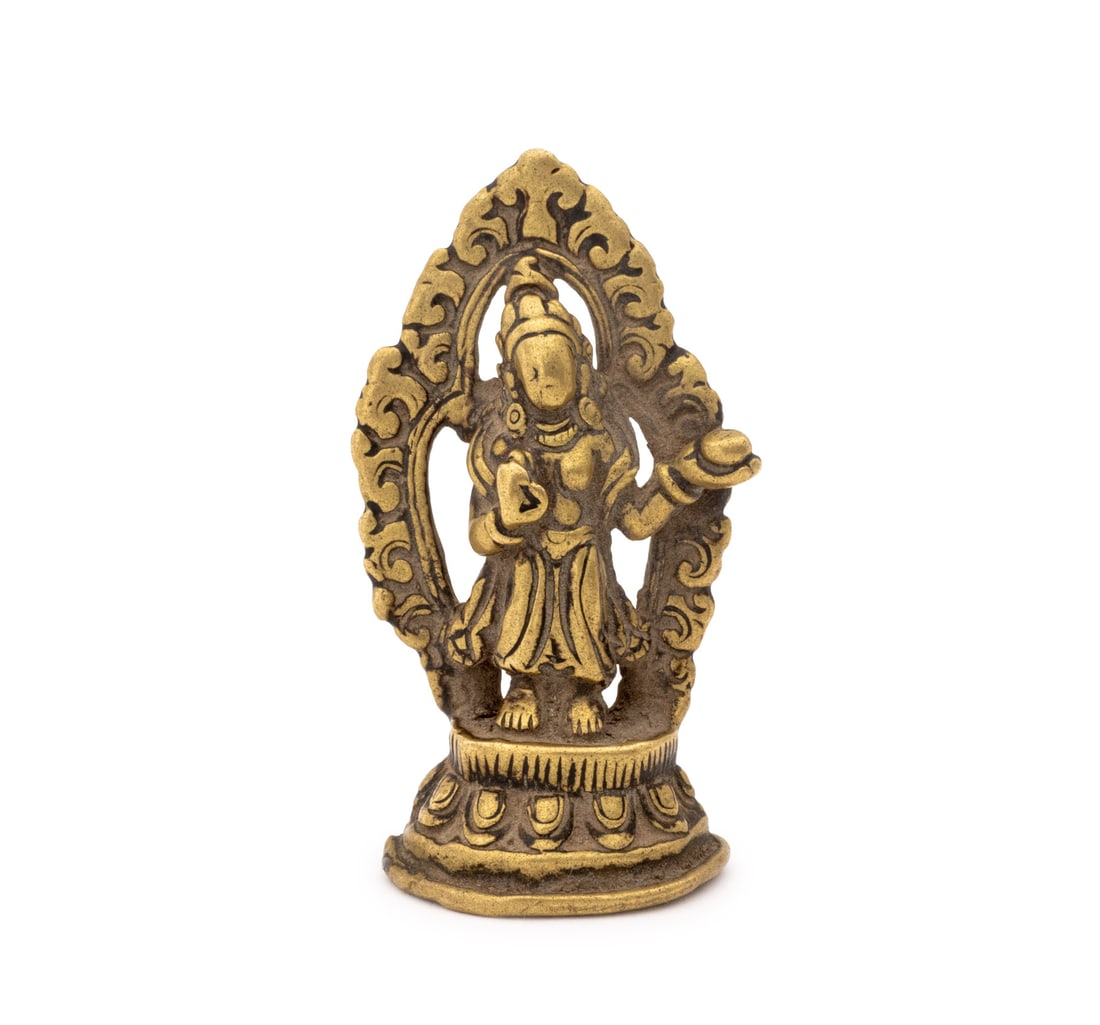 Tibetan Bodhisattva Gilt Bronze Sculpture: Western Tibetan Bodhisattva Gilt Bronze Diminutive Sculpture, 16th century or earlier, the female figure holding a bowl surrounded by a mandorla and standing atop a lotus pedestal. 2.75" H x 1.5" W x