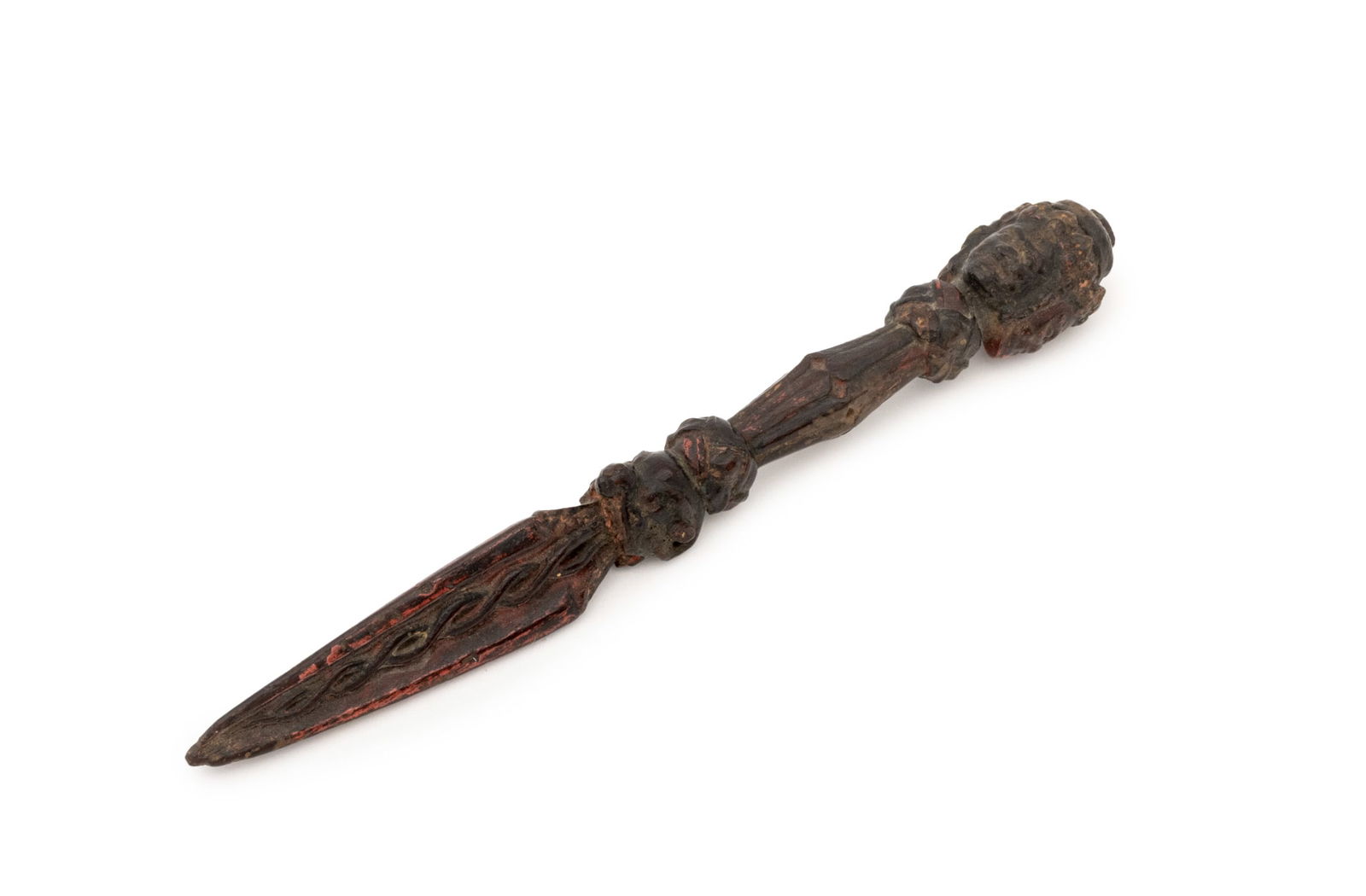 Tibetan Carved and Red Lacquered Wood Phurba: Eastern Tibetan Carved and Red Lacquered Wood Phurba, 18th century or earlier, the handle carved with four faces in the form of Hayagriva, the blade three sided. 8" L x 1" Diameter. Provenance: From t
