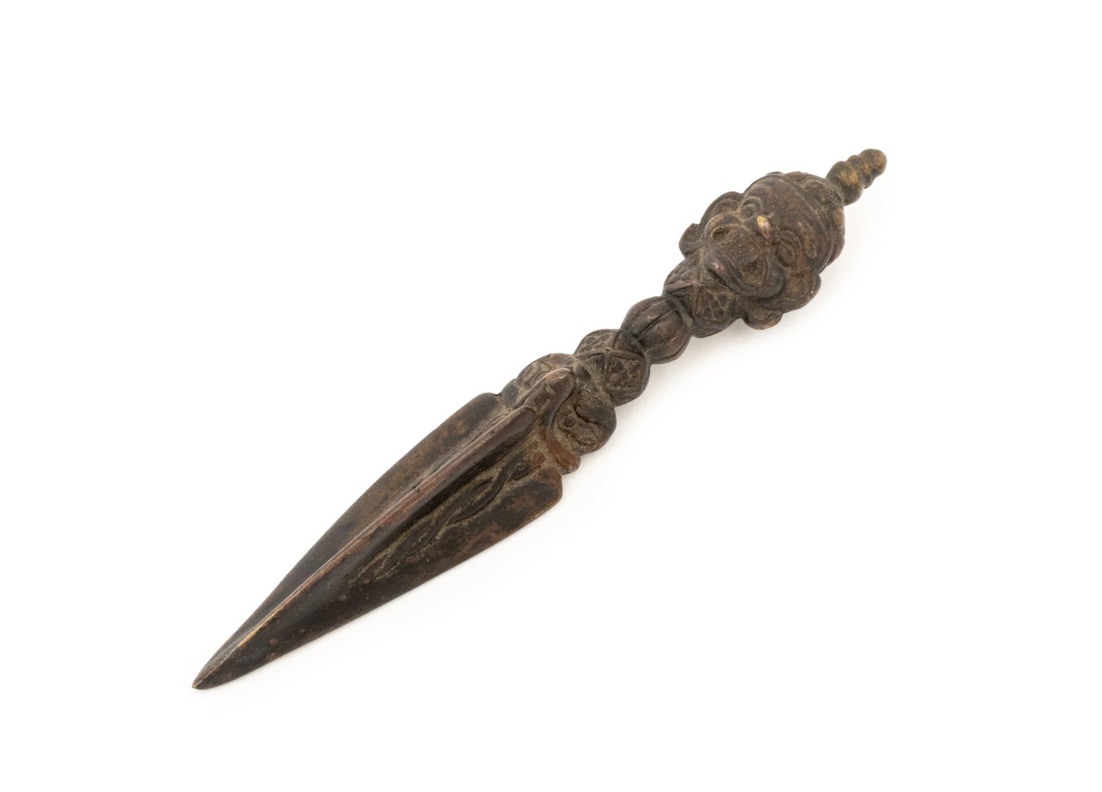 Tibetan Patinated Bronze Phurba Ritual Dagger: Eastern Tibetan Patinated Bronze Phurba Ritual Dagger, 19th century or earlier, the handle in the form of Hayagriva's head, bird head above three-sided blade. 4" L x 0.5" Diameter. Provenance: From th