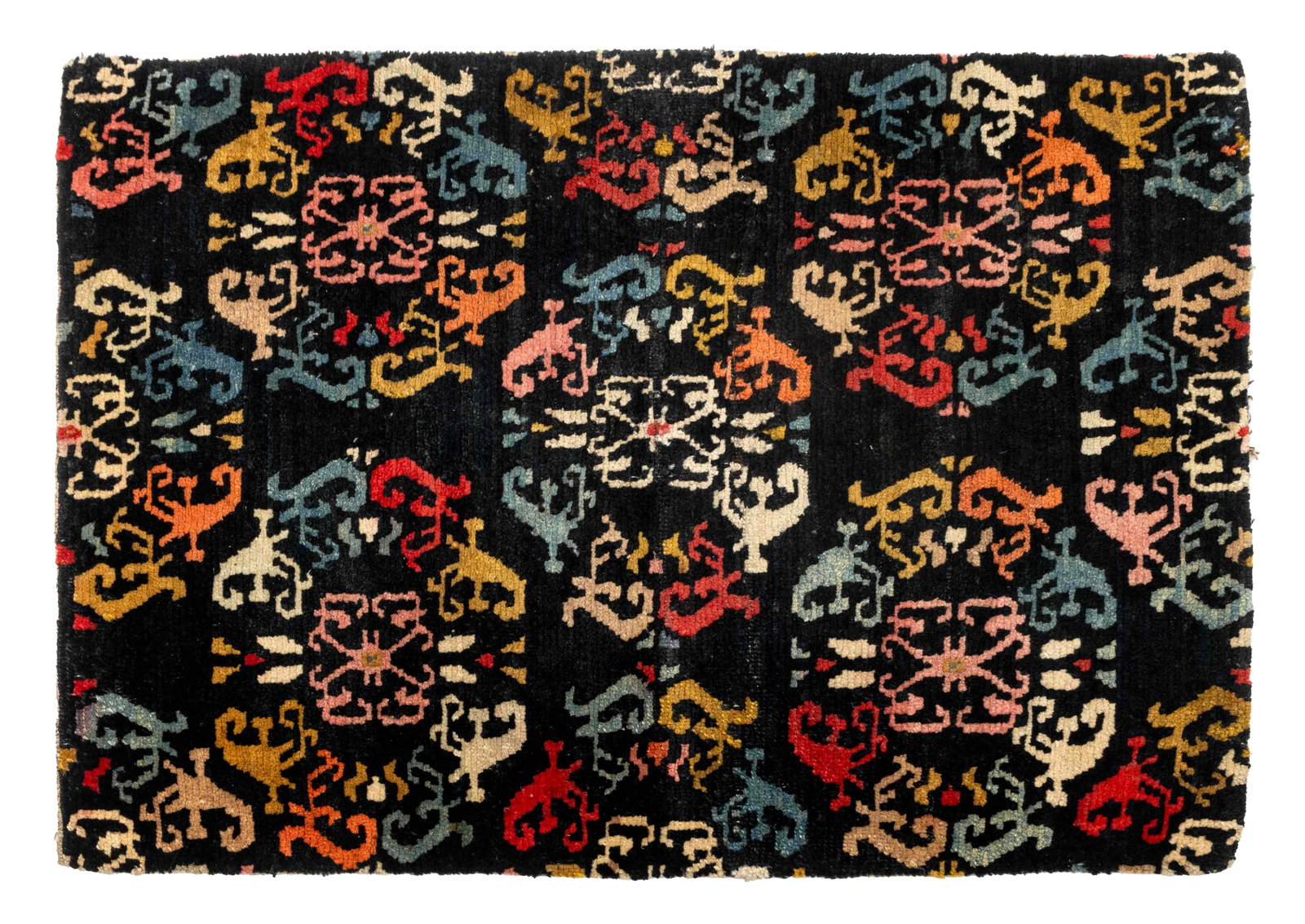 Tibetan Lotus Flower Khaden Rug, 2' 7.5" x 1' 10": Tibetan Lotus Flower Motif Khaden Wool Rug, on a black ground. 2' 7.5" L x 1' 10" W. Provenance: From the Estate of Joseph Lawrence Gardella. Keywords: Himalayan Art, Nepal, Asian Art, Pema Chuni, Tex