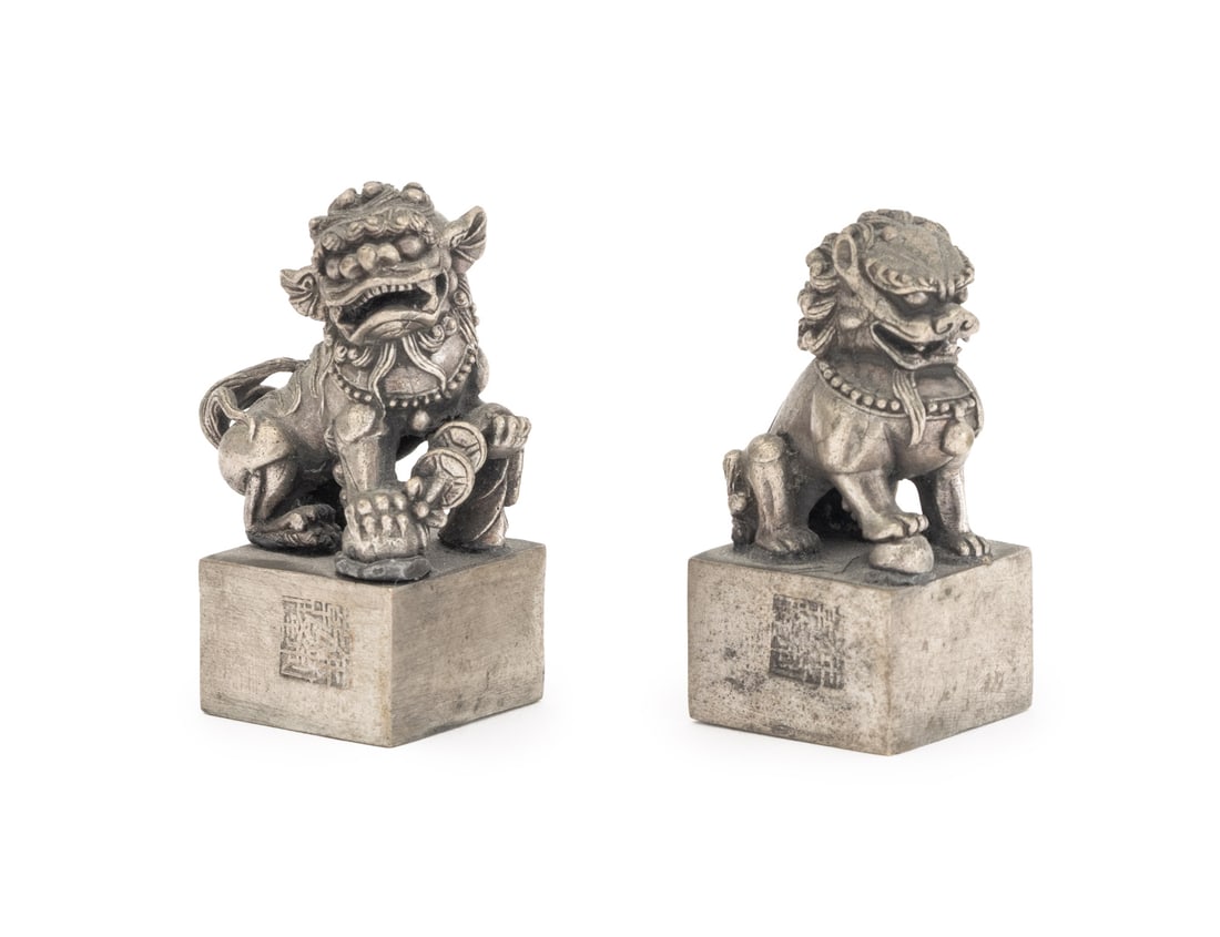 Chinese Tibetan Silver Plate Foo Lion Seals, Pair: Pair of Chinese Tibetan Silver Plate Foo Lion Motif Chop Seals, one male and one female, each with stamped marked to the base. Slightly larger: 1.75" H x 1" W x 0.75" D. Provenance: From the Estate of