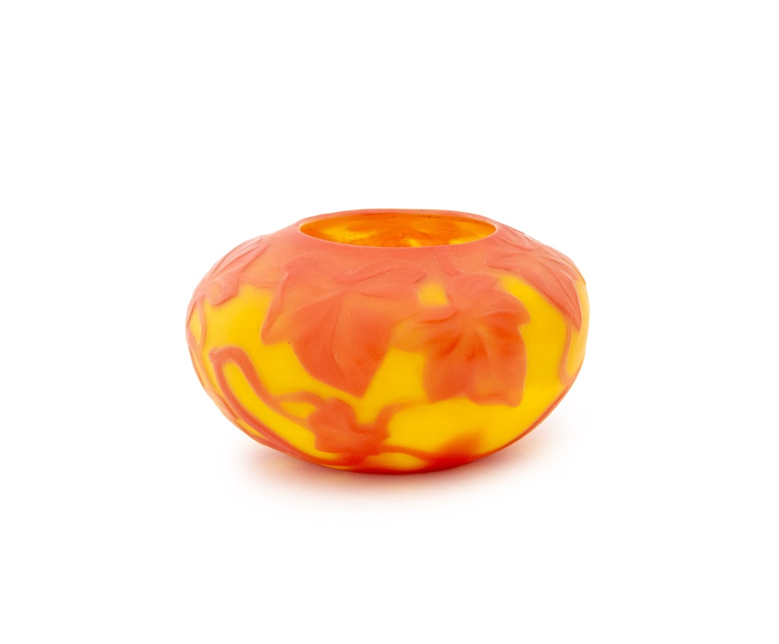 Tiffany Studios Favrile Cameo Glass Vase, ca. 1905: Tiffany Studios Favrile Cameo Glass Vase, 1895-1915, the small ovoid vessel in deep yellow glass overlaid in red and finely wheel-carved with ivy leafage and trailing vines, marked "L.C.T." to undersi