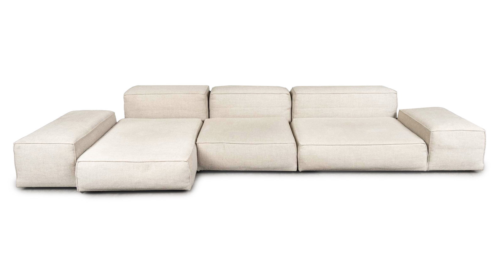 Piero Lissoni for Living Divani Sectional Sofa: Piero Lissoni (Italian, b. 1956) for Living Divani Modular Sofa, in eight pieces with beige upholstery, Living Divani and "Made in Italy" labels. Overall: 24" H x 96" W x 110" D; seat: 13" H. Provenan