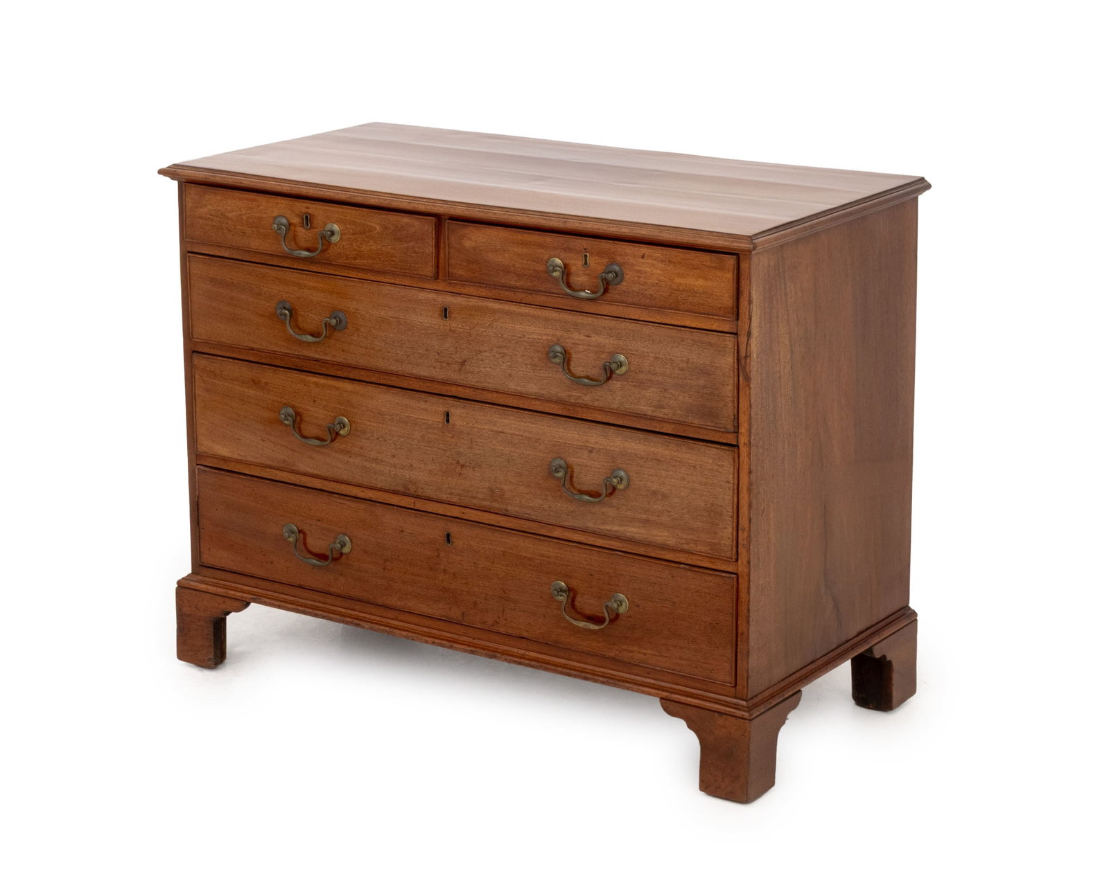 George III Mahogany Chest of Drawers, ca. 1780: George III Mahogany Chest of Drawers, circa 1780, with two short drawers and three long graduated drawers with brass pulls. 32" H x 41.25" W x 21.25" D. Provenance: Wellesley Wilson, Chester. From a 3