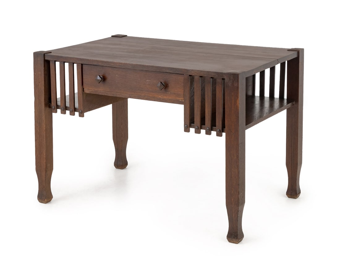 J.M. Young and Sons Arts and Crafts Oak Desk: J.M. Young and Sons Arts and Crafts Oak Desk, circa 1920, with single drawer and slat sides, "J.M. Young and Sons / Camden, New York" label to underside. 29.5" H x 42.25" W x 28.25" D. Provenance: Fro