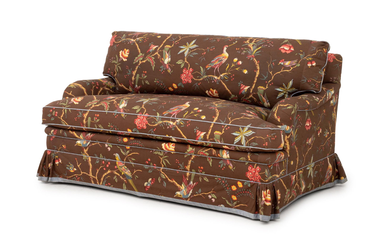 Brunschwig & Fils Upholstered Two-Seat Sofa: Brunschwig & Fils Upholstered Two-Seat Sofa, with bird and flower pattern upholstery, label to underside of cushion. 34" H x 60" W x 38" D; seat: 19" H. Provenance: From a New York City Estate. Keywor