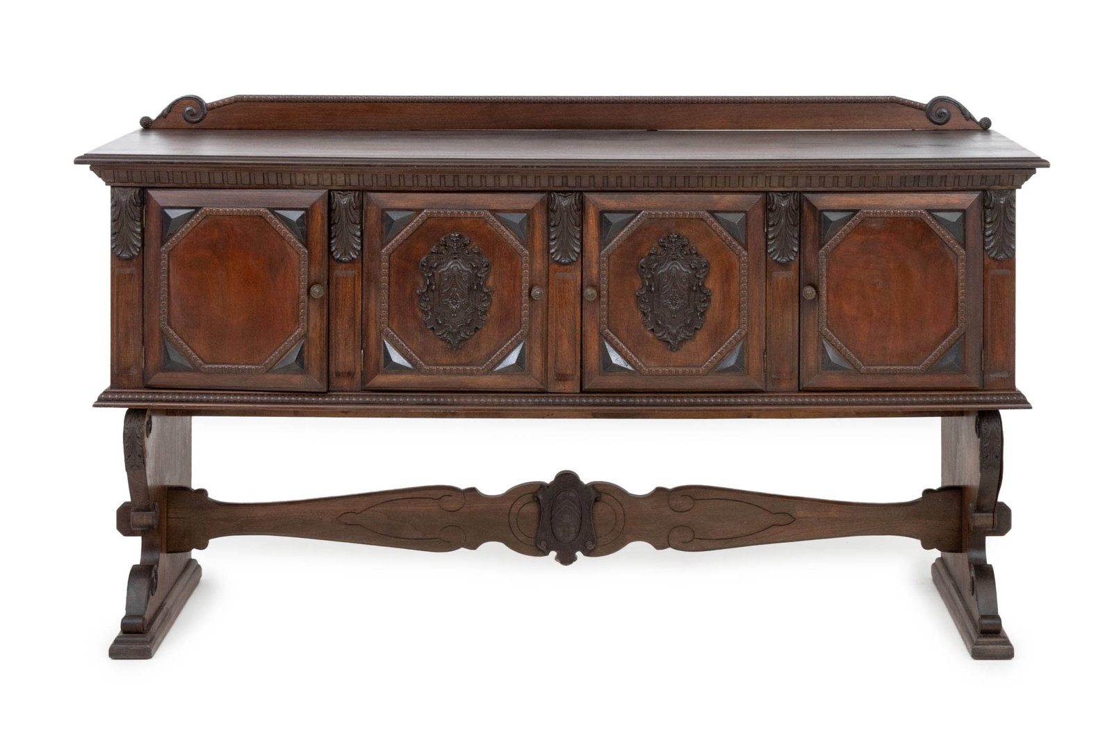 Renaissance Revival Mahogany Sideboard: Renaissance Revival Mahogany Sideboard, the two central doors with carved crests opening to three drawers flanked by single cabinet doors on each side above scroll form legs, Carson Pirie Scott & Co.