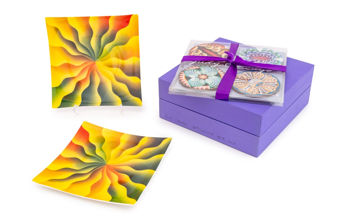 Judy Chicago Commemorative Tableware, 10 Pcs.: Collection of 10 Judy Chicago Commemorative Tableware Pieces, comprising: (2) two "Painting Studying for the Great Ladies Dinner Plate", porcelain display plate, 2019, for 80th Birthday celebration, n
