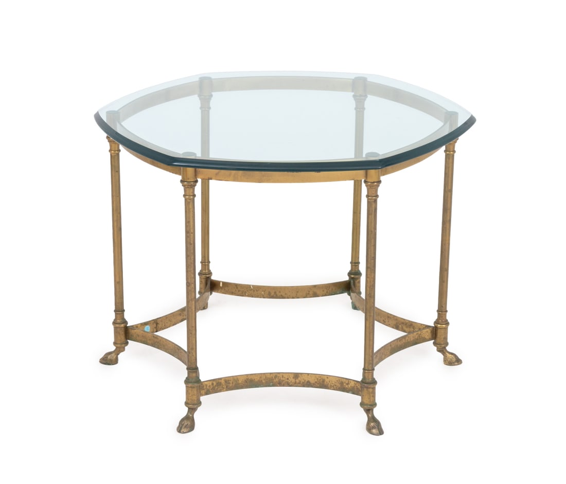 La Barge Style Glass Top and Brass Table: La Barge Style Glass Top and Brass Table, the hexagonal beveled glass top above six leg base with hoof feet, "Made in Italy" label to base. 22" H x 30" Diameter. Provenance: From a New York City