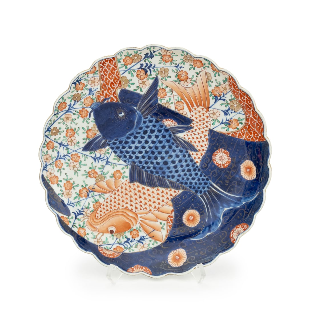 Japanese Koi Fish Motif Imari Porcelain Plate: Japanese Koi Fish Motif Imari Porcelain Plate, with floriform rim and hand-painted decoration. 10.75" Diameter x 1.75" H. Provenance: From the Estate of Joseph Lawrence Gardella. Keywords: Asian Art,