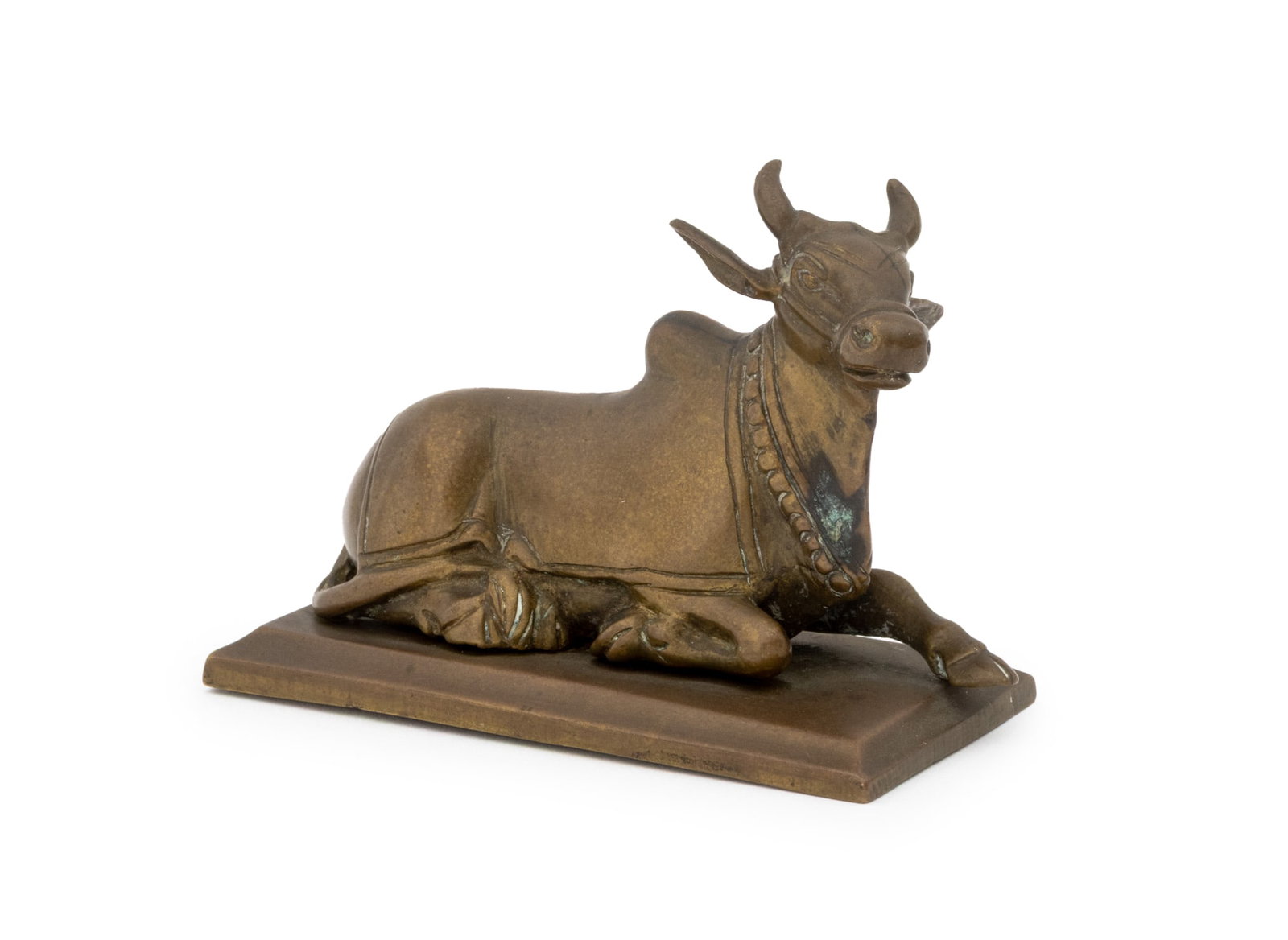 Indian Seated Bull Brass Sculpture, 19th C.: Indian Seated Bull Brass Sculpture, 19th century or earlier, mounted on a rectangular base. Overall: 3" H x 4" W x 2" D. Provenance: From the Estate of Joseph Lawrence Gardella. Keywords: South Asian