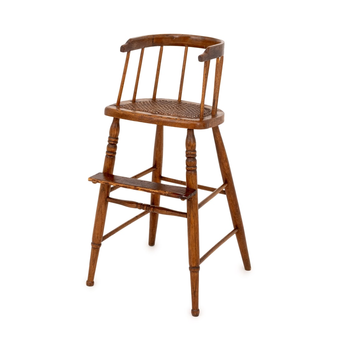 Victorian Cane-Paneled Oak Children's Chair: Victorian Cane-Paneled Oak Spindle Back Children's High Chair. 29.75" H x 15.5" W x 18" D; seat: 23" H. Provenance: From a 390 West End Avenue Estate. Keywords: Antique Furniture, Children's Furniture
