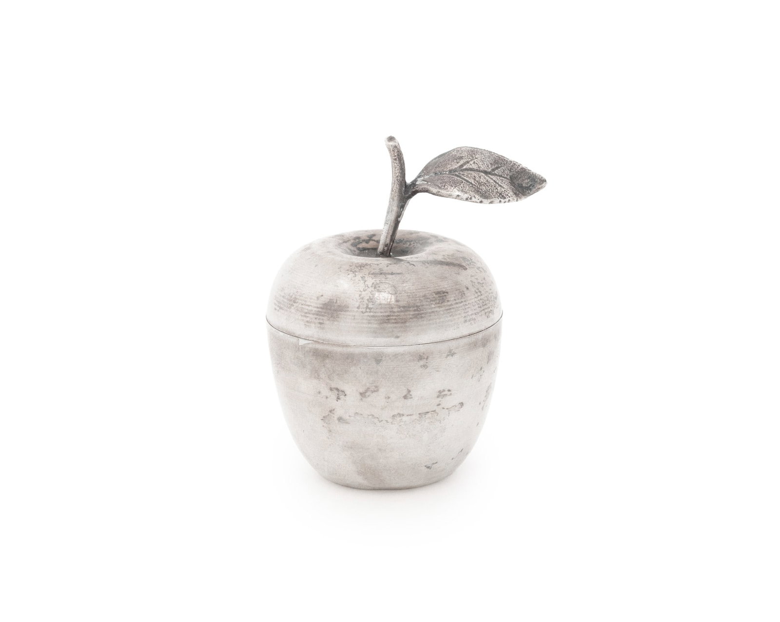 Tiffany & Co. Makers 925 Silver Apple Form Box: Tiffany and Company Makers Sterling Silver Apple Form Pill Box, with gilt washed interior and marked "Tiffany & Co. / Makers / Sterling / 25008" to underside. Weight: 0.82 ozt.; 2" H x 1.25" Diameter.