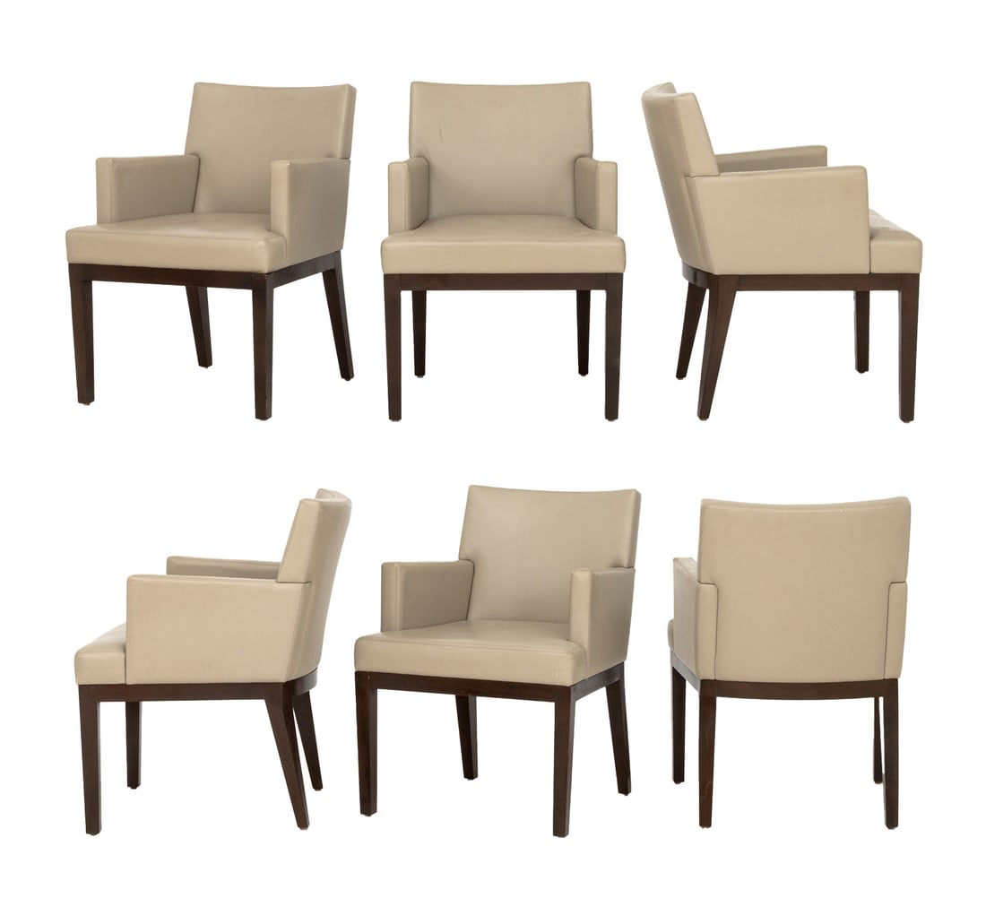 Christian Liaigre Style Dining Chairs, 6: Set of Six Christian Liaigre Style Dining Armchairs, with taupe upholstery on wood legs. 33" H x 24.5" W x 25" D; seat: 19" H; armrests: 26" H. Provenance: From an 157 West 57th Street Collection. Key