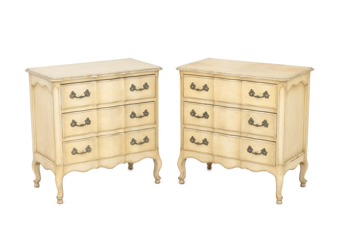 French Provincial Style Painted Nightstands, Pair: Pair of French Provincial Style Cream Painted Nightstands, each with three drawers on cabriole legs. 29.5" H x 29.25" W x 16" D. Provenance: From a Connecticut Estate. Keywords: Vintage Furniture, Bed