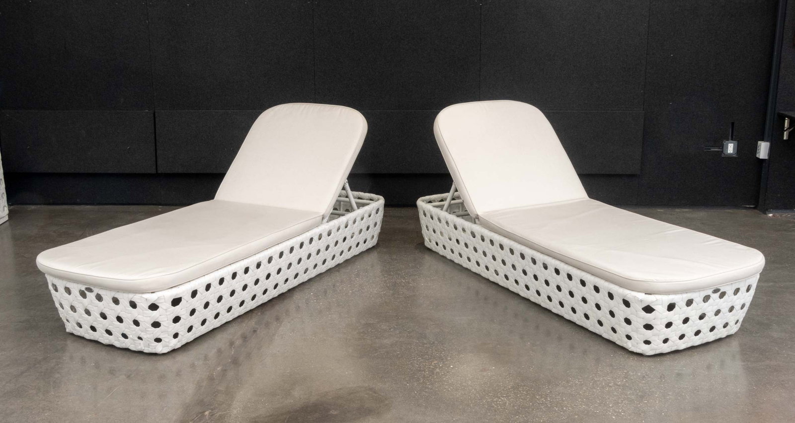 Skyline Design Chaise Longues, Pair: Pair of Skyline Design Chaise Longues, with adjustable backs, white woven plastic frames, and beige cushions. Back flat: 15.25" H x 80" W x 30.75" D. Provenance: From a Warren, New Jersey Collection. 