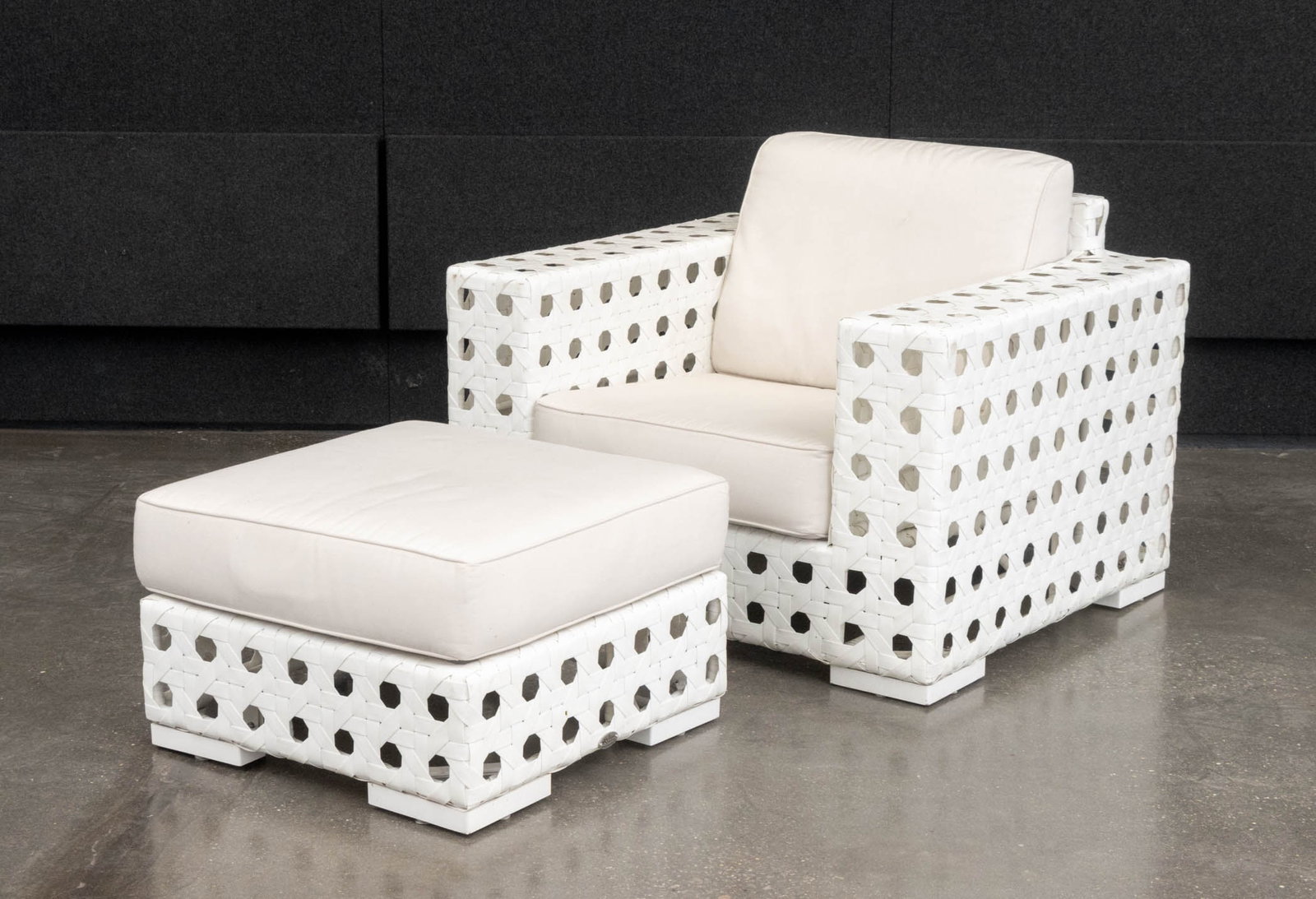 Skyline Design Lounge Chair and Ottoman: Skyline Design Lounge Chair and Ottoman, with white woven plastic frames and beige cushions. Chair: 36" H x 42" W x 36" D; seat: 17.5" H. Provenance: From a Warren, New Jersey Collection. Keywords: Pa