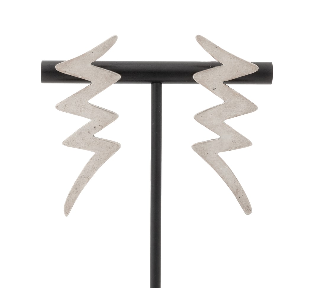 Mexican Sterling Silver Lightning Bolt Earrings: Pair of Mexican Sterling Silver Lightning Bolt Form Earrings, featuring brightly polished surfaces, worn through pierced earlobes with posts and friction backs, marked: "TR-70 925 Mexico". Measuring